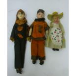 A Lenci girl doll in peasant costume with moulded felt face, felt outfit and hat, sewn label to