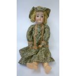 A Louis Wolf & Co bisque head doll "Queen Louise", with brown glass sleeping eyes, open mouth and