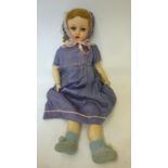 A Belgian sprayed bisque head doll, c.1930, with blue glass sleeping eyes, painted open mouth, brown