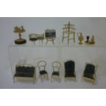 A collection of fret cut bone dolls house furniture including settee, easy chair and love seat (