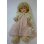 A French SFBJ bisque head laughing Jumeau doll, with brown glass sleeping eyes, painted mouth and