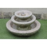 A PINK GRANITE FOUNTAIN, modern, of three tier circular form, 32" wide, 19" high (Est. plus 18%