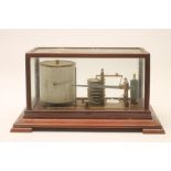 A MAHOGANY CASED BAROGRAPH, early 20th century, with brass cylinder and eight tier vacuum, the