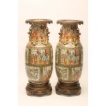 A PAIR OF CANTONESE PORCELAIN VASES of rounded cylindrical form with chi-long handles and