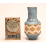 TWO TROIKA EARTHENWARE VASES, c.1977, one of plain slab form with roundels in relief painted in