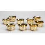 A SET OF FOUR SILVER GILT FINGER BOWLS, maker's mark WS over HS, London 1929, of slightly flared