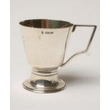 AN ART DECO SILVER MUG, makers Burns, Oats & Washbourne Ltd., London 1946, the rounded conical