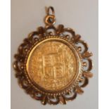 A VICTORIA YH SOVEREIGN, 1875, in a 9ct gold loose pendant mount, 12.9g total (Est. plus 18% premium