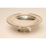 A LOW PEDESTAL SILVER TAZZA, makers Adie Bros., Birmingham 1924, of plain dished circular form