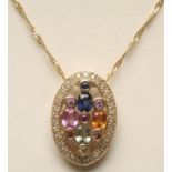 A MULTI-GEM SET PENDANT of oval form, the claw and open back collet set mixed stones within a border