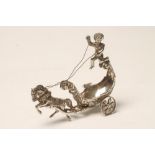 A CONTINENTAL SILVER NOVELTY SALT, possibly Swedish, cast as a cherub driving a horse drawn chariot,