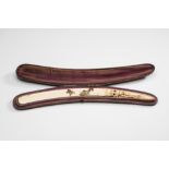 A JAPANESE IVORY PAGE TURNER, Meiji period, the curved blade with a silvered and bronzed lacquer