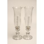 A PAIR OF BACCARAT HURRICANE LAMPS, the tall "U" shaped shades with frilled rims and etched with