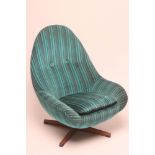 A GREAVES & THOMAS EGG CHAIR, 1960's, now recovered in a striped turquoise weave, on faux wood X