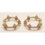 A PAIR OF DIAMOND SET 18CT GOLD HOOP EARRINGS, the hinged fascia and rear inner sections each claw