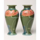 A PAIR OF THOMAS FORESTER EARTHENWARE VASES, early 20th century, painted by R. Dean, in dusky pinks,