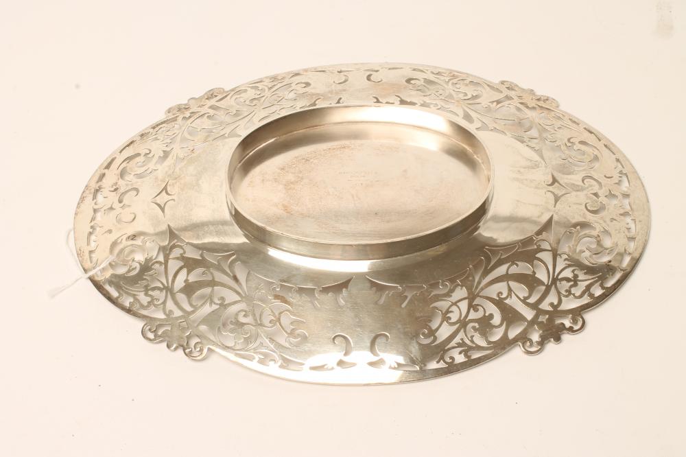 A SILVER DISH, makers Viners, Sheffield 1956, of lobed oval form, the wide rim pierced with - Image 3 of 3