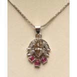 A DIAMOND PENDANT, the marquise cut stone of approximately 0.30cts open back collet set to a leaf