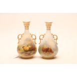 A PAIR OF ROYAL WORCESTER CHINA VASES, 1909, of rounded conical form with scroll handles, one