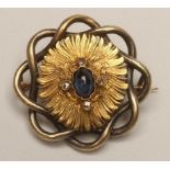 A LATE 19TH CENTURY SAPPHIRE AND DIAMOND BROOCH, possibly part Indian, the engraved central panel