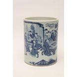 A CHINESE PORCELAIN BRUSH POT of plain cylindrical form painted in underglaze blue with a continuous