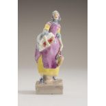 "FAIR CHERRYES", a Royal Worcester china figure, 1940, modelled by Gwendolen Parnell and wearing a