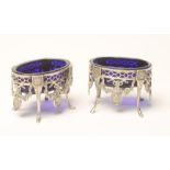 A PAIR OF EARLY VICTORIAN SILVER SALTS, maker possibly G.F. Pinnell, London 1846, of oval form,