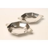 A PAIR OF ART DECO SILVER SMALL DISHES, makers Wm. Greenwood & Sons, London 1939, of slightly dished