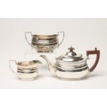 A MATCHED AND COMPOSITE SILVER THREE PIECE TEA SERVICE, teapot maker's mark indistinct, London 1943,