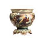 A ROYAL WORCESTER CHINA SMALL JARDINIERE, 1905, of circular form with four foliate strapwork moulded