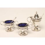 A SILVER THREE PIECE CRUET, maker's mark MR, London 1920, of pedestal ovoid form, with bright cut