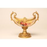 A ROYAL WORCESTER PEDESTAL COMPORT, 1930, of oval form with two acanthus leaf sheathed high loop