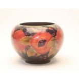 A MOORCROFT BURSLEM POTTERY BOWL, early 20th century, of globular form, tubelined and painted in