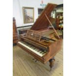 A BOUDOIR GRAND PIANO by Rufolf Stelzhamer in walnut case with stringing, oblong pierced fret