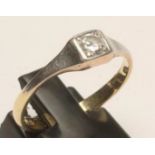 A SOLITAIRE DIAMOND RING, the brilliant cut stone of approximately 0.25cts in a square setting on