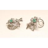 A PAIR OF DIAMOND AND EMERALD CLIP FLOWERHEAD EARRINGS, in white gold, Birmingham 1981, sponsor's