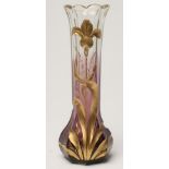 AN ART NOUVEAU GLASS VASE of swept octagonal form with bevelled rim, cut and gilded with an iris