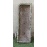 A SANDSTONE TROUGH of narrow rounded oblong form, well cut, 52 1/2" x 18" x 8 1/2" (Est. plus 18%