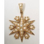 A VICTORIAN 18CT GOLD AND PEARL STAR PENDANT, the six pointed star set with graduated half and