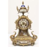 A FRENCH GILT METAL AND PORCELAIN TABLE CLOCK by Japy Freres et Cie, the twin barrel movement