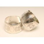 A PAIR OF VICTORIAN SILVER NAPKIN RINGS, maker's mark possibly JRM over GW, Sheffield 1878, of bombe