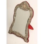 AN EDWARDIAN SILVER EASEL BACK MIRROR, maker's mark indistinct, Birmingham 1904, the bevelled