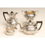 A LATE VICTORIAN FOUR PIECE SILVER TEA SERVICE, makers Martin, Hall & Co., Sheffield 1890, of