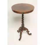 A VICTORIAN ROSEWOOD WINE TABLE, the circular top and plain frieze raised on spiral twist stem