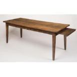 AN ELM FARMHOUSE TABLE, 19th century, the three plank top on plain frieze with sliding work