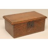 AN OAK BOX, late 17th century, of oblong form, the hinged lid opening to fitted interior with hinged