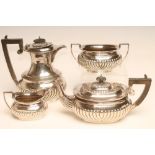 A COMPOSITE FOUR PIECE SILVER TEA AND COFFEE SERVICE, makers Asprey & Co. Ltd., Birmingham 1917 (