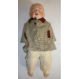 A Gebruder Knoch bisque shoulder head boy character doll with intaglio eyes, moulded hair,