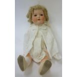 An Edmund Edelmann "Melitta" bisque head character doll with brown glass sleeping eyes, open mouth