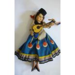 A "Meripose" felt girl doll by Holzer & CIA, S. Paulo, Brazil, with moulded painted face, wood